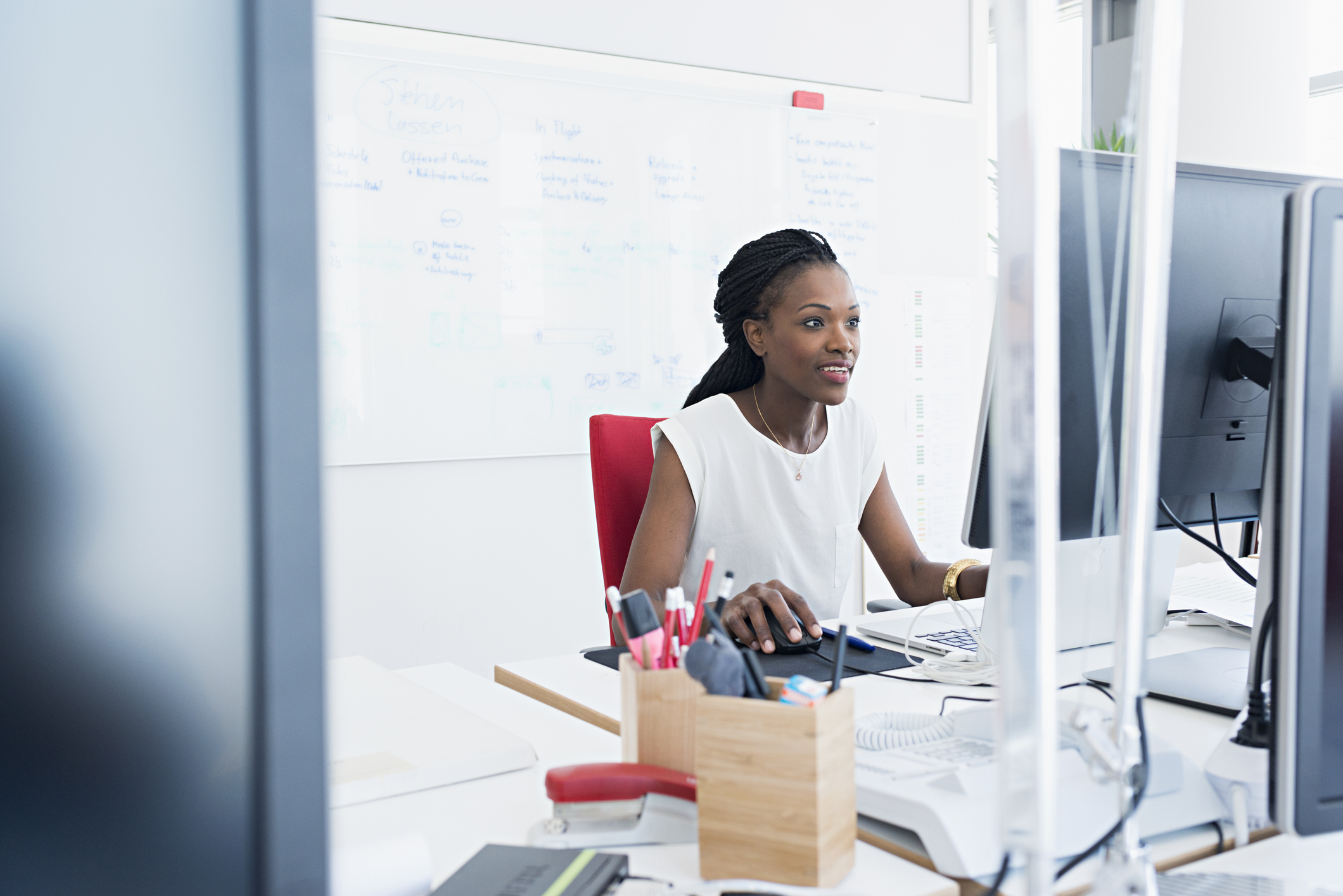 Woman working on computer in office